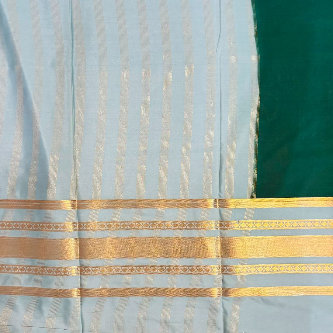Green and sea green boarder Mysore Crape Semi