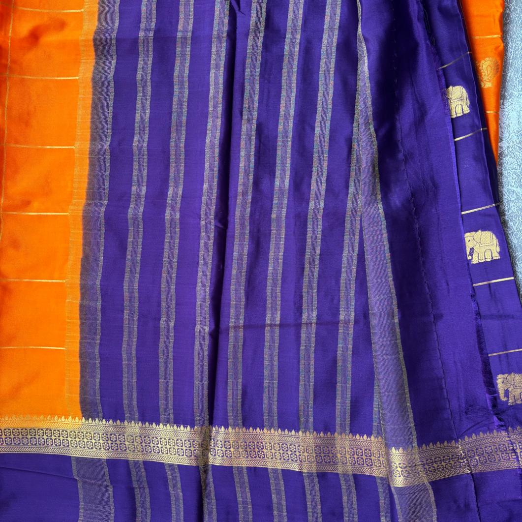 Deep orange and purple checks with bentex boarder premium semi mysore crape saree