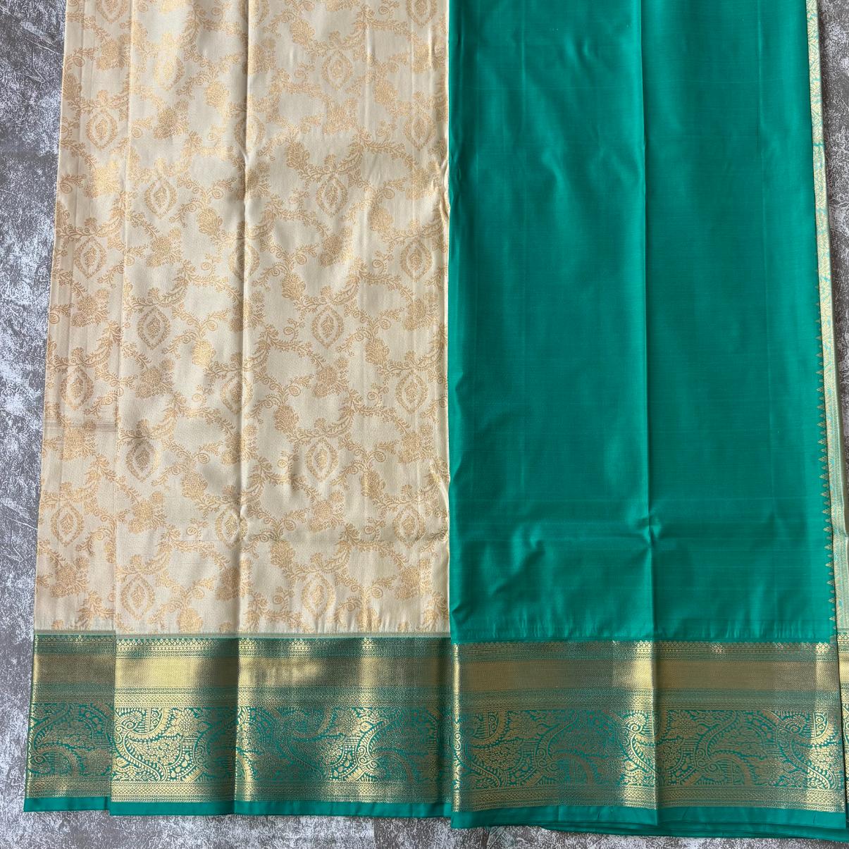 Off white and Emerald green pure mix kanjivaram saree
