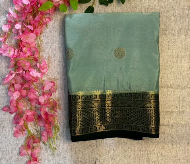 Sea Green and Green boarder with silver and golden buttas Mysore Crape Semi