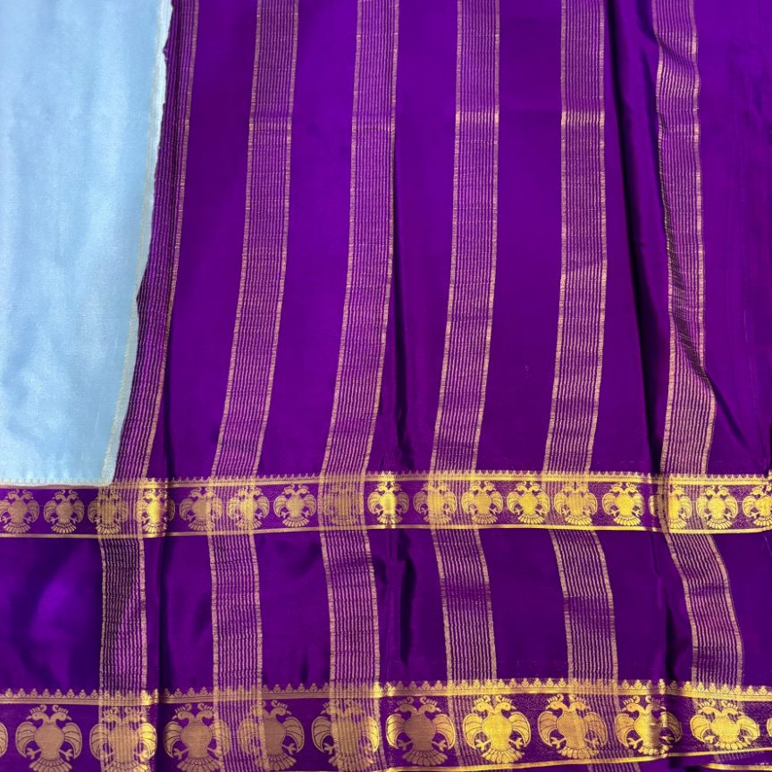 Sea green and Purple Ganda berunda boarder Mysore Crape Semi