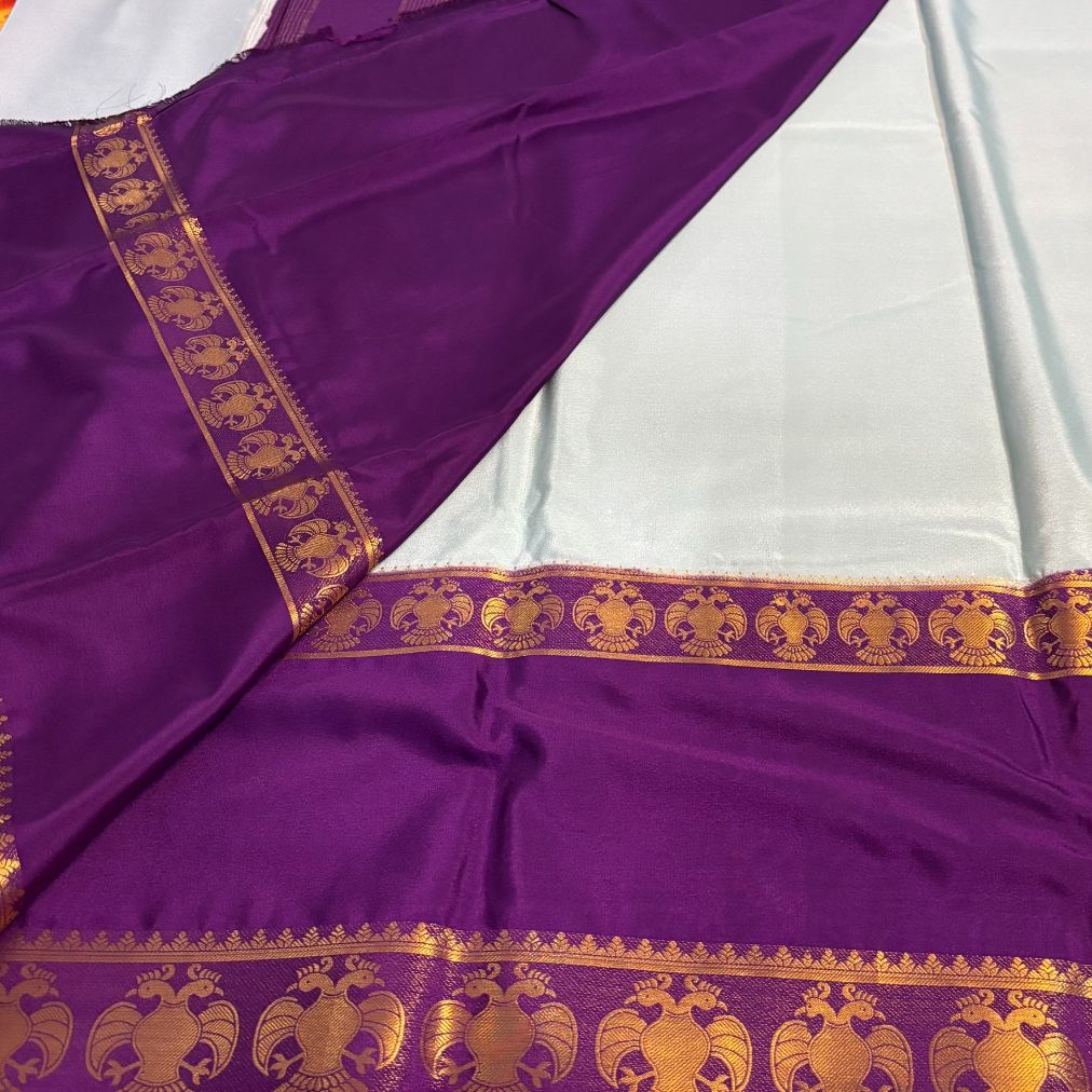 Sea green and Purple Ganda berunda boarder Mysore Crape Semi